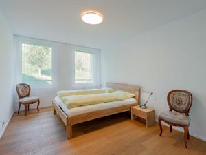 Postel nebo postele na pokoji v ubytování Apartment Mülihof by Interhome