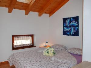 Postel nebo postele na pokoji v ubytování Apartment ai Casell by Interhome