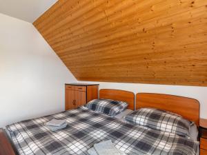Кровать или кровати в номере Holiday Home Holiday Hill 62 by Interhome
