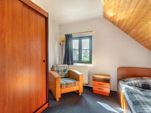 Postel nebo postele na pokoji v ubytování Holiday Home Holiday Hill 62 by Interhome