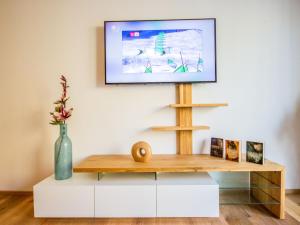 Telewizja i/lub zestaw kina domowego w obiekcie Apartment Runhof Living by Interhome