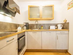 Kuchnia lub aneks kuchenny w obiekcie Apartment Runhof Living by Interhome