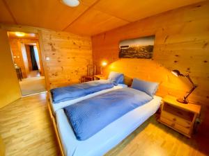 Krevet ili kreveti u jedinici u objektu Apartment Chalet Jungtalblick- Wohnung Chilcheri by Interhome