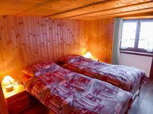 Katil atau katil-katil dalam bilik di Apartment Casa Alpetta by Interhome