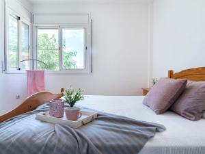 Posteľ alebo postele v izbe v ubytovaní Holiday Home Fontibre by Interhome