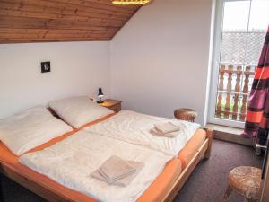 Llit o llits en una habitació de Holiday Home Zásada by Interhome