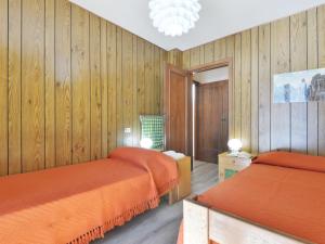 Posteľ alebo postele v izbe v ubytovaní Apartment Condominio al Parco-9 by Interhome