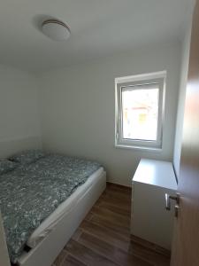 Voodi või voodid majutusasutuse Relax Apartment toas