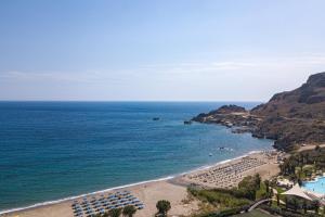 an aerial view of a beach and the ocean at Mythos Apartments in Damnoni