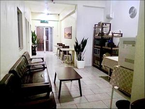 Гостиная зона в Ozzy Lodge Semporna