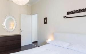 A bed or beds in a room at Pistrucci by Halldis