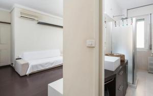 A bed or beds in a room at Pistrucci by Halldis