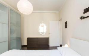 A bed or beds in a room at Pistrucci by Halldis