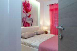 Posteľ alebo postele v izbe v ubytovaní Apartments Villa Pupa