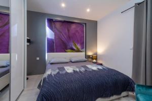Posteľ alebo postele v izbe v ubytovaní Apartments Villa Pupa