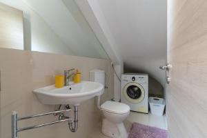 Kúpeľňa v ubytovaní Apartments Villa Pupa