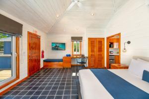 Voodi või voodid majutusasutuse Barefoot Cay Resort toas