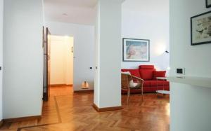 A seating area at Conca Del Naviglio by Halldis