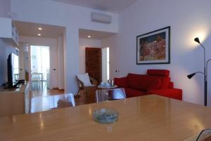 A seating area at Conca Del Naviglio by Halldis