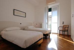 A bed or beds in a room at Conca Del Naviglio by Halldis