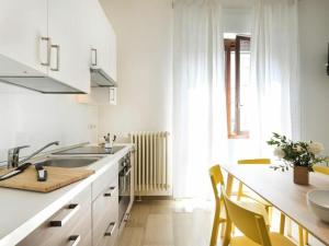 A kitchen or kitchenette at Alberto Mario by Halldis