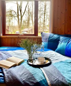 Ein Bett oder Betten in einem Zimmer der Unterkunft Ferienhäuser Pannier I und oder II