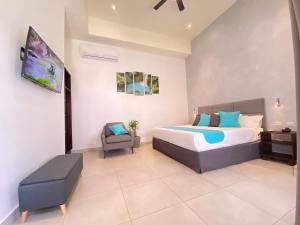 Кровать или кровати в номере Hotel Naoz