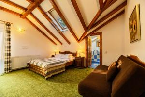 Un pat sau paturi într-o cameră la Regina