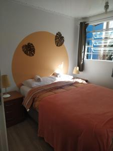 Ένα ή περισσότερα κρεβάτια σε δωμάτιο στο Social Hostel Café e Bar