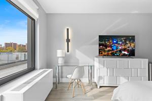 TV a/nebo společenská místnost v ubytování Global Luxury Suites at The Arches