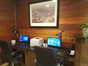 an office with two computers on a desk at Best Western Crossroads Inn in DeFuniak Springs