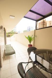A balcony or terrace at Apartamento Guaratuba