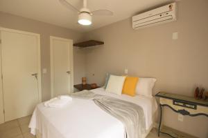 Katil atau katil-katil dalam bilik di Apartamento Guaratuba