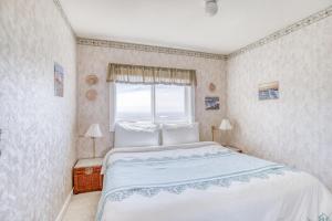 Ένα ή περισσότερα κρεβάτια σε δωμάτιο στο Optiaqua