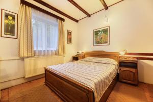 Postel nebo postele na pokoji v ubytování Pension Casa Bradul