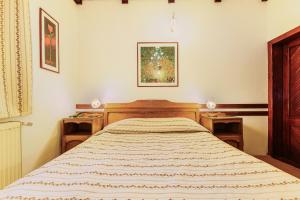Postel nebo postele na pokoji v ubytování Pension Casa Bradul