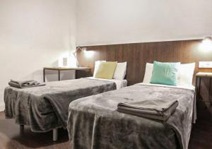Postel nebo postele na pokoji v ubytování Traveller House + 13 fotografií