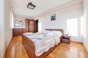 Tempat tidur dalam kamar di Family Homes - Apartamenty Bursztynowe