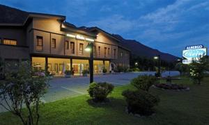 a large building with a sign in front of it at Albergo Ristorante Cicin in Casale Corte Cerro