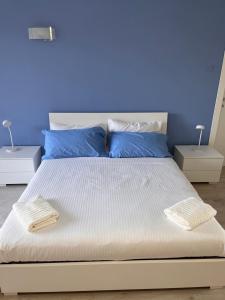Letto o letti in una camera di Casa Cost
