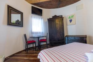Postel nebo postele na pokoji v ubytování Agroturizam Duvančić - Konoba dida Marka