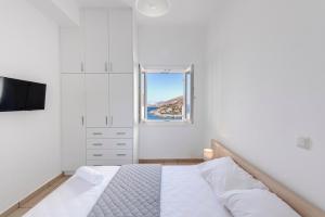 Postel nebo postele na pokoji v ubytování Waterview Apartments