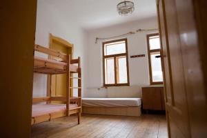 Postel nebo postele na pokoji v ubytování Ubytování U Tlusťocha