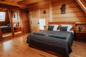 Postel nebo postele na pokoji v ubytování Willa Sołdrówka