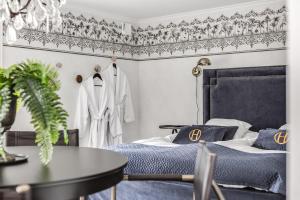 Postel nebo postele na pokoji v ubytování Högbo Brukshotell & Spa