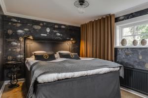 Postel nebo postele na pokoji v ubytování Högbo Brukshotell & Spa