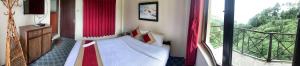 Hotel Sakura Durbarにあるベッド