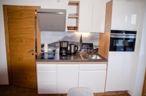 Eldhús eða eldhúskrókur á Appartements Lederer