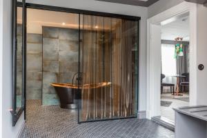 Koupelna v ubytování Högbo Brukshotell & Spa + 37 fotografií