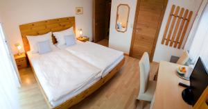 Postel nebo postele na pokoji v ubytování Appartements Lederer